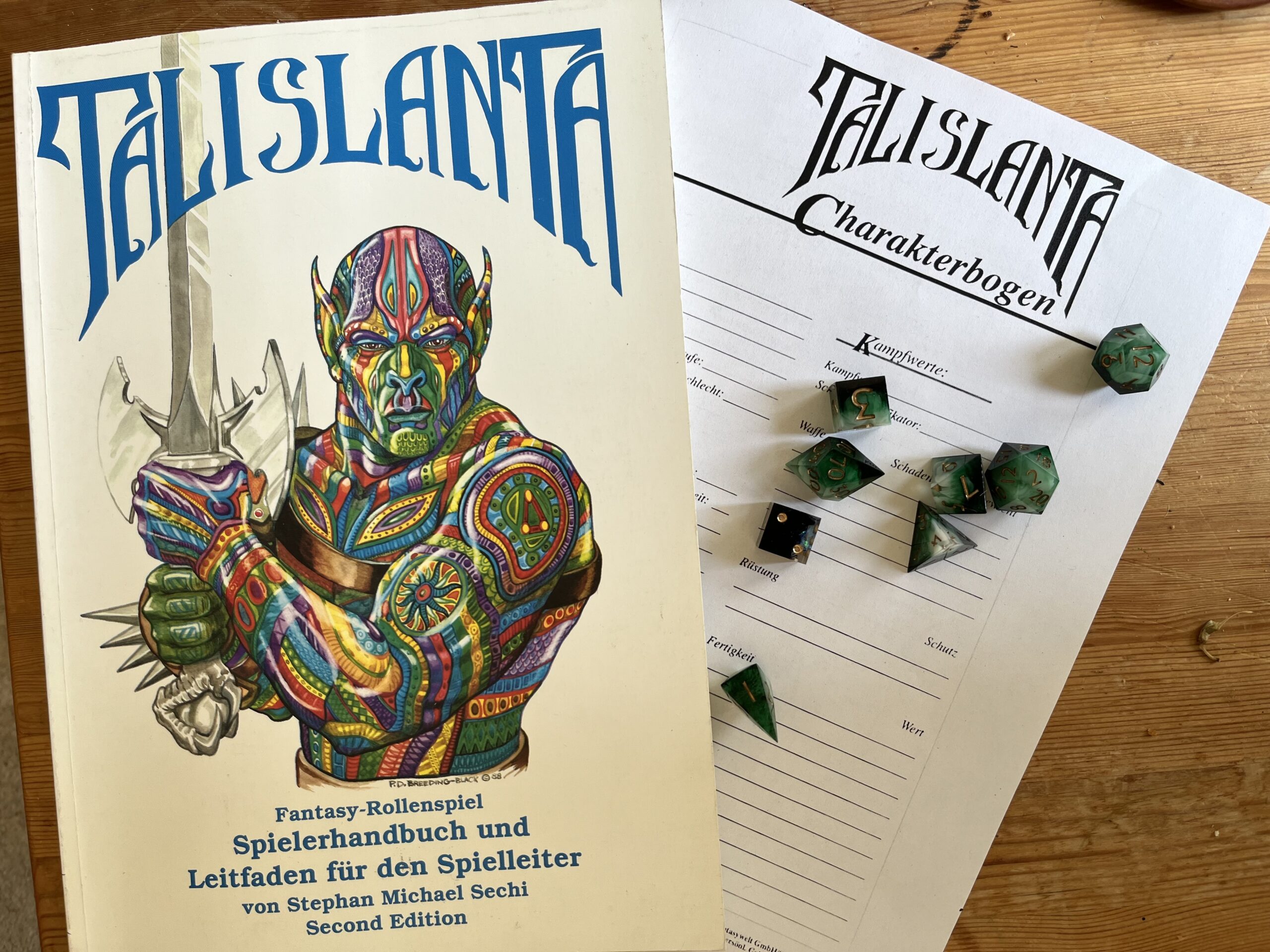 Talislanta-Grundregelwerk, ein Charakterbogen, Würfel.